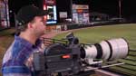 Ray Manard Films a Rochester Red Wings Baseball Game From the Dugout